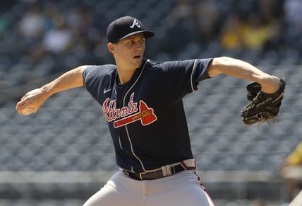 Aug 24, 2022; Pittsburgh, Pennsylvania, USA;  Atlanta Braves starting pitcher Kyle Wright (30) delivers a pitch against the Pittsburgh Pirates during the first inning at PNC Park. Mandatory Credit: Charles LeClaire-USA TODAY Sports