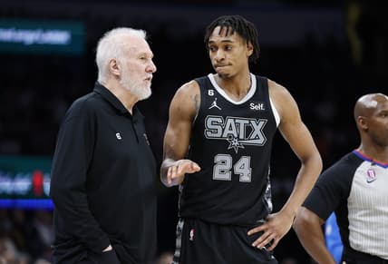 Nov 30, 2022; Oklahoma City, Oklahoma, USA; San Antonio Spurs head coach Gregg Popovich talks to guard Devin Vassell (24) between plays against the Oklahoma City Thunder during the second quarter at Paycom Center. Mandatory Credit: Alonzo Adams-USA TODAY Sports