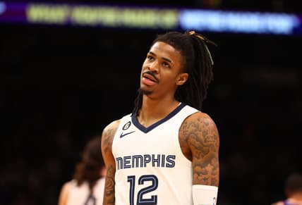 Jan 22, 2023; Phoenix, Arizona, USA; Memphis Grizzlies guard Ja Morant (12) reacts against the Phoenix Suns in the second half at Footprint Center. Mandatory Credit: Mark J. Rebilas-USA TODAY Sports