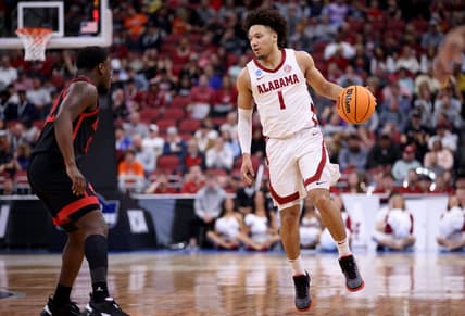 Mar 24, 2023; Louisville, KY, USA; Alabama Crimson Tide guard Mark Sears (1) dribbles against San Diego State Aztecs guard Darrion Trammell (12) during the first half of the NCAA tournament round of sixteen at KFC YUM! Center. Mandatory Credit: Jordan Prather-USA TODAY Sports