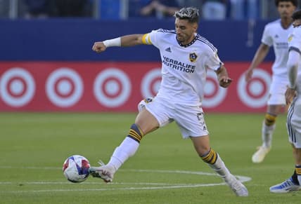 Apr 1, 2023; Carson, California, USA; Los Angeles Galaxy midfielder Gaston Brugman (5) handles the ball during the game against the Seattle Sounders at Dignity Health Sports Park. Mandatory Credit: Jayne Kamin-Oncea-USA TODAY Sports