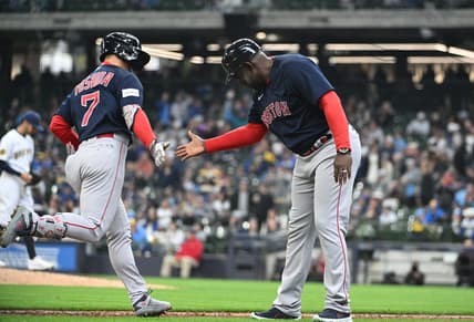 Apr 23, 2023; Milwaukee, Wisconsin, USA;Boston Red Sox left fielder Masataka Yoshida (7) celebrates with Boston Red Sox third base coach Carlos Febles (53) after hitting a home run against the Milwaukee Brewers in the eighth inning at American Family Field. Mandatory Credit: Michael McLoone-USA TODAY Sports