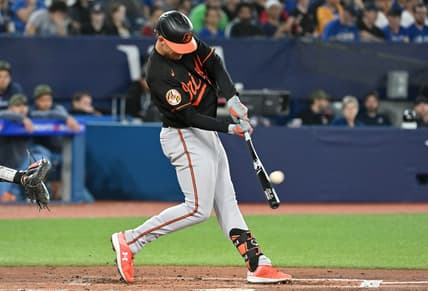 May 19, 2023; Toronto, Ontario, CAN;   Baltimore Orioles first baseman Ryan Mountcastle (6) hits a three run home run against the Toronto Blue Jays in the third inning at Rogers Centre. Mandatory Credit: Dan Hamilton-USA TODAY Sports