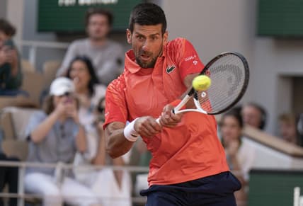 Jun 2, 2023; Paris,France; Novak Djokovic (SRB) returns a shot during his match against Alejandro Davidovich Fokina (ESP) on day six at Stade Roland-Garros. Mandatory Credit: Susan Mullane-USA TODAY Sports