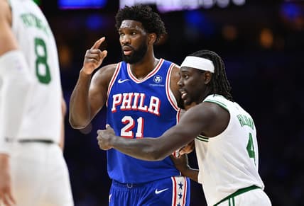 Nov 8, 2023; Philadelphia, Pennsylvania, USA; Boston Celtics guard Jrue Holiday (4) defends Philadelphia 76ers center Joel Embiid (21) in the third quarter at Wells Fargo Center. Mandatory Credit: Kyle Ross-USA TODAY Sports