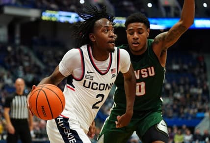 Nov 14, 2023; Hartford, Connecticut, USA; UConn Huskies guard Tristen Newton (2) drives the ball against Mississippi Valley State Delta Devils guard Rayquan Brown (0) in the first half at XL Center. Mandatory Credit: David Butler II-USA TODAY Sports