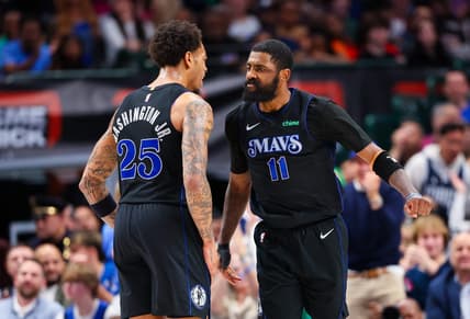 Feb 22, 2024; Dallas, Texas, USA;  Dallas Mavericks guard Kyrie Irving (11) celebrates with Dallas Mavericks forward P.J. Washington (25) during the second half against the Phoenix Suns at American Airlines Center. Mandatory Credit: Kevin Jairaj-USA TODAY Sports