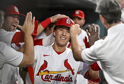 Aug 16, 2022; St. Louis, Missouri, USA;  St. Louis Cardinals second baseman Tommy Edman (19) is congratulated y teammates after hitting a solo home run against the Colorado Rockies during the fourth inning at Busch Stadium. Mandatory Credit: Jeff Curry-USA TODAY Sports