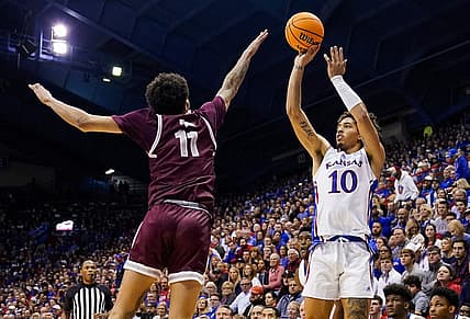 Nov 28, 2022; Lawrence, Kansas, USA; Kansas Jayhawks forward Jalen Wilson (10) shoots over Texas Southern Tigers guard Jordan Gilliam (11) during the second half at Allen Fieldhouse. Mandatory Credit: Jay Biggerstaff-USA TODAY Sports
