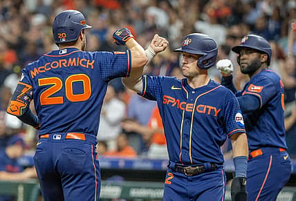 Aug 21, 2023; Houston, Texas, USA; Houston Astros third baseman Alex Bregman (2) and designated hitter Yordan Alvarez (44) celebrate left fielder Chas McCormick (20) three run home run against the Boston Red Sox in the fourth inning at Minute Maid Park. Mandatory Credit: Thomas Shea-USA TODAY Sports