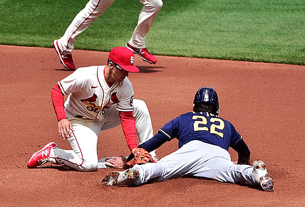 Apr 10, 2021; St. Louis, Missouri, USA;  St. Louis Cardinals second baseman Tommy Edman (19) is unable to tag out Milwaukee Brewers left fielder Christian Yelich (22) as he steals second during the first inning at Busch Stadium. Mandatory Credit: Jeff Curry-USA TODAY Sports