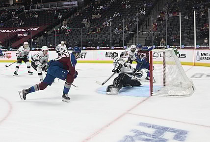 May 12, 2021; Denver, Colorado, USA; Colorado Avalanche left wing J.T. Compher (37) scores a goal past Los Angeles Kings goaltender Calvin Petersen (40) during the second period at Ball Arena. Mandatory Credit: Ron Chenoy-USA TODAY Sports