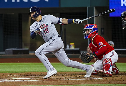 May 21, 2021; Arlington, Texas, USA; Houston Astros shortstop Aledmys Diaz (16) hits an rbi fielder's choice during the second inning against the Texas Rangers at Globe Life Field. Mandatory Credit: Kevin Jairaj-USA TODAY Sports