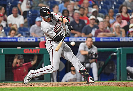 Aug 26, 2021; Philadelphia, Pennsylvania, USA; Arizona Diamondbacks shortstop Nick Ahmed (13) hits a two run home run against the Philadelphia Phillies during the fourth inning at Citizens Bank Park. Mandatory Credit: Eric Hartline-USA TODAY Sports