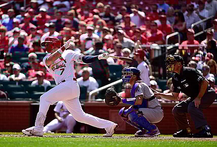 Sep 9, 2021; St. Louis, Missouri, USA;  St. Louis Cardinals catcher Andrew Knizner (7) hits a one run double during the second inning against the Los Angeles Dodgers at Busch Stadium. Mandatory Credit: Jeff Curry-USA TODAY Sports