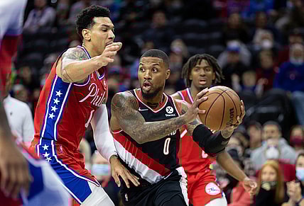 Nov 1, 2021; Philadelphia, Pennsylvania, USA; Portland Trail Blazers guard Damian Lillard (0) drives against Philadelphia 76ers forward Danny Green (14) during the first quarter at Wells Fargo Center. Mandatory Credit: Bill Streicher-USA TODAY Sports