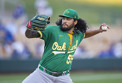 Mar 29, 2022; Phoenix, Arizona, USA; Oakland Athletics pitcher Sean Manaea against the Los Angeles Dodgers during spring training at Camelback Ranch-Glendale. Mandatory Credit: Mark J. Rebilas-USA TODAY Sports
