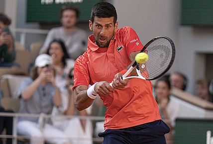 Jun 2, 2023; Paris,France; Novak Djokovic (SRB) returns a shot during his match against Alejandro Davidovich Fokina (ESP) on day six at Stade Roland-Garros. Mandatory Credit: Susan Mullane-USA TODAY Sports