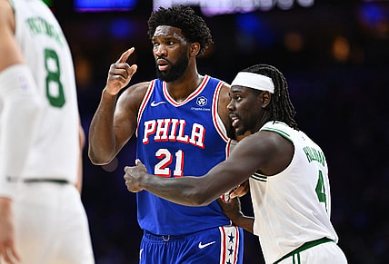 Nov 8, 2023; Philadelphia, Pennsylvania, USA; Boston Celtics guard Jrue Holiday (4) defends Philadelphia 76ers center Joel Embiid (21) in the third quarter at Wells Fargo Center. Mandatory Credit: Kyle Ross-USA TODAY Sports