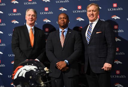 Tony Romo hasn't been discussed by Vance Joseph, John Elway and Co.?