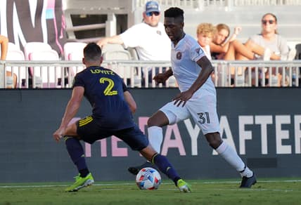 Aug 8, 2021; Fort Lauderdale, FL, USA; Inter Miami CF defender Kelvin Leerdam (31) dribbles the ball around Nashville SC defender Daniel Lovitz (2) during the first half at DRV PNK Stadium. Mandatory Credit: Jasen Vinlove-USA TODAY Sports