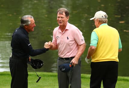 Apr 4, 2018; Augusta, GA, USA; From left Gary Player , Tom Watson and Jack Nicklaus shake hands on the 9th green during the Par 3 Contest before the Masters golf tournament at Augusta National Golf Club. Mandatory Credit: Rob Schumacher-USA TODAY Sports