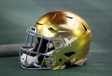 Jan 1, 2022; Glendale, Arizona, USA; Detailed view of a gold Notre Dame Fighting Irish helmet during the 2022 Fiesta Bowl at State Farm Stadium. Mandatory Credit: Mark J. Rebilas-USA TODAY Sports