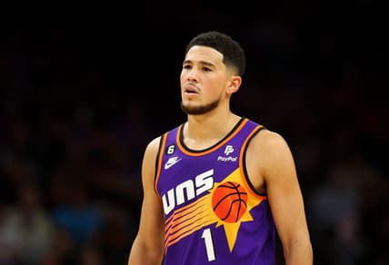 Nov 30, 2022; Phoenix, Arizona, USA; Phoenix Suns guard Devin Booker (1) against the Chicago Bulls at Footprint Center. Mandatory Credit: Mark J. Rebilas-USA TODAY Sports