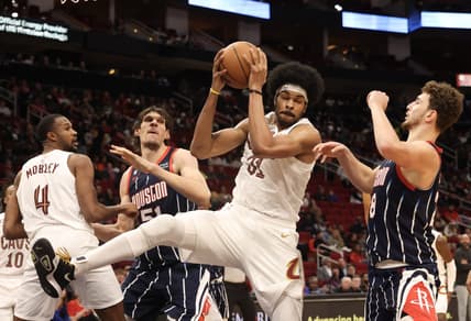 Jan 26, 2023; Houston, Texas, USA;  Cleveland Cavaliers center Jarrett Allen (31) grabs a defensive rebound against Houston Rockets center Alperen Sengun (28) in the second quarter at Toyota Center. Mandatory Credit: Thomas Shea-USA TODAY Sports