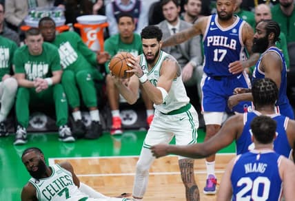 Feb 8, 2023; Boston, Massachusetts, USA; Boston Celtics guard Jaylen Brown (7) is hit by forward Jayson Tatum (0) against the Philadelphia 76ers in the second quarter at TD Garden. Mandatory Credit: David Butler II-USA TODAY Sports