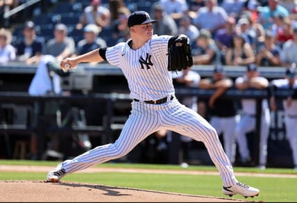 Feb 26, 2023; Tampa, Florida, USA; New York Yankees starting pitcher Clarke Schmidt (86) throws a pitch during the first inning against the Atlanta Braves at George M. Steinbrenner Field. Mandatory Credit: Kim Klement-USA TODAY Sports
