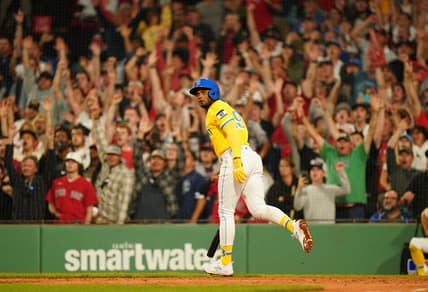 Aug 7, 2023; Boston, Massachusetts, USA; Boston Red Sox shortstop Pablo Reyes (19) hits a grand slam to end the game against the Kansas City Royals in the ninth inning at Fenway Park. Mandatory Credit: David Butler II-USA TODAY Sports