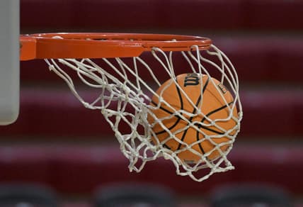 Dec 22, 2023; Los Angeles, California, USA; Detailed view of a basketball going through the net during a game between the Loyola Marymount Lions and the Colorado State Rams at Gersten Pavilion. Mandatory Credit: Jayne Kamin-Oncea-USA TODAY Sports