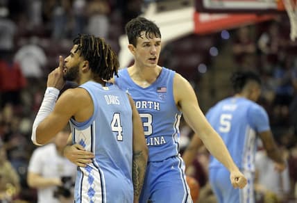Jan 27, 2024; Tallahassee, Florida, USA; North Carolina Tarheels guard RJ Davis (4) and guard Cormac Ryan (3) celebrate after winning the game against the Florida State Seminoles at Donald L. Tucker Center. Mandatory Credit: Melina Myers-USA TODAY Sports