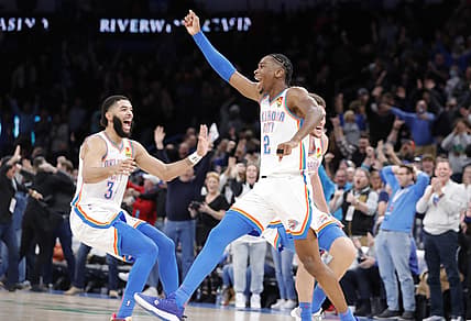 Dec 18, 2021; Oklahoma City, Oklahoma, USA; Oklahoma City Thunder guard Shai Gilgeous-Alexander (2) celebrates after shooting a three point basket at the buzzer to defeat the LA Clippers during the second half at Paycom Center. Oklahoma City won 104-103. Mandatory Credit: Alonzo Adams-USA TODAY Sports