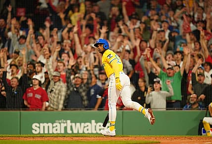 Aug 7, 2023; Boston, Massachusetts, USA; Boston Red Sox shortstop Pablo Reyes (19) hits a grand slam to end the game against the Kansas City Royals in the ninth inning at Fenway Park. Mandatory Credit: David Butler II-USA TODAY Sports