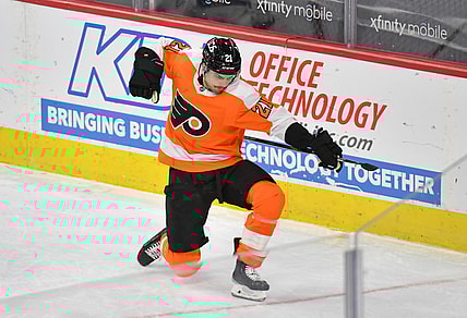 Jan 30, 2021; Philadelphia, Pennsylvania, USA;  Philadelphia Flyers left wing Scott Laughton (21) celebrates his game-winning goal during overtime against the New York Islanders at Wells Fargo Center. Mandatory Credit: Eric Hartline-USA TODAY Sports