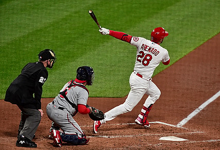 Apr 13, 2021; St. Louis, Missouri, USA;  St. Louis Cardinals third baseman Nolan Arenado (28) hits a two run home run during the third inning against the Washington Nationals at Busch Stadium. Mandatory Credit: Jeff Curry-USA TODAY Sports