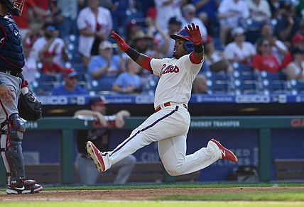 Jun 5, 2021; Philadelphia, Pennsylvania, USA; Philadelphia Phillies infielder Jean Segura (2) slides towards home plate to score a run during the fourth inning against the Washington Nationals at Citizens Bank Park. Mandatory Credit: Kyle Ross-USA TODAY Sports