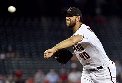 Aug 19, 2021; Phoenix, Arizona, USA;  Arizona Diamondbacks starting pitcher Madison Bumgarner (40) throws inn the first inning against the Philadelphia Phillies at Chase Field. Mandatory Credit: Matt Kartozian-USA TODAY Sports