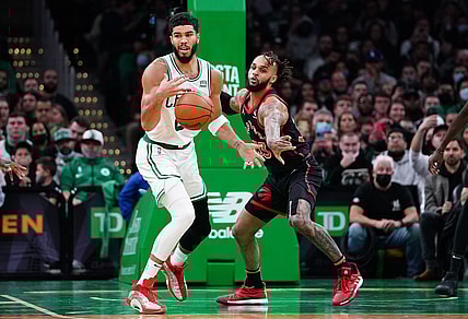 Nov 10, 2021; Boston, Massachusetts, USA; Toronto Raptors guard Gary Trent Jr. (33) defends against Boston Celtics forward Jayson Tatum (0) in the second quarter at TD Garden. Mandatory Credit: David Butler II-USA TODAY Sports