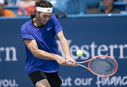 Aug 18, 2022; Cincinnati, OH, USA; Taylor Fritz (USA) returns a shot during his match against Andrey Rublev (RUS) at the Western & Southern Open at the at the Lindner Family Tennis Center. Mandatory Credit: Susan Mullane-USA TODAY Sports