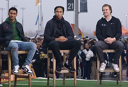 Alabama Crimson Tide Bryce Young (left) and Ohio State' Buckeye C.J. Stroud (center) pictured in a file photo with Pittsburgh Steelers quarterback Kenny Pickett talk with ESPN Game Day before the game between the Army Black Knights and the Navy Midshipmen at MetLife Stadium. Mandatory Credit: Vincent Carchietta-USA TODAY Sports
