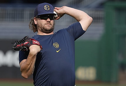 Sep 4, 2023; Pittsburgh, Pennsylvania, USA; Milwaukee Brewers relief pitcher Andrew Chafin (32) throws in the outfield before the game against the Pittsburgh Pirates at PNC Park. Mandatory Credit: Charles LeClaire-USA TODAY Sports