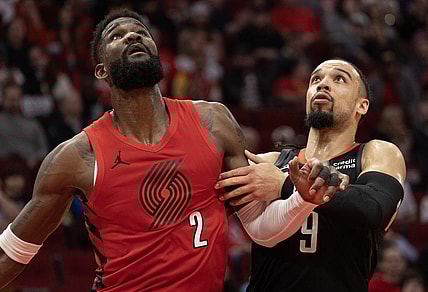 Jan 24, 2024; Houston, Texas, USA; Portland Trail Blazers center Deandre Ayton (2) tries to box out Houston Rockets forward Dillon Brooks (9) in the second quarter at Toyota Center. Mandatory Credit: Thomas Shea-USA TODAY Sports