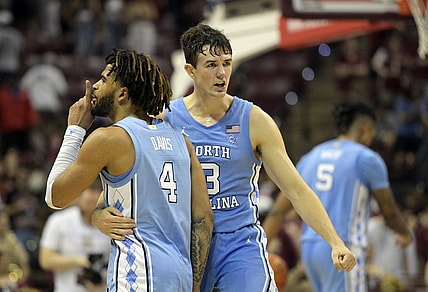 Jan 27, 2024; Tallahassee, Florida, USA; North Carolina Tarheels guard RJ Davis (4) and guard Cormac Ryan (3) celebrate after winning the game against the Florida State Seminoles at Donald L. Tucker Center. Mandatory Credit: Melina Myers-USA TODAY Sports