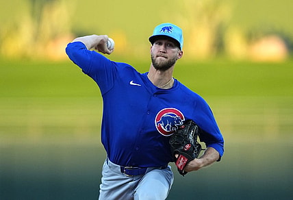 Mar 5, 2024; Surprise, Arizona, USA; Chicago Cubs starting pitcher Caleb Kilian (45) pitches against the Kansas City Royals during the first inning at Surprise Stadium. Mandatory Credit: Joe Camporeale-USA TODAY Sports