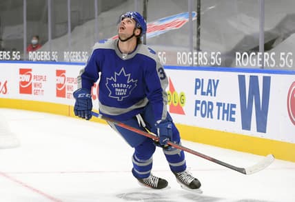 Feb 6, 2021; Toronto, Ontario, CAN;  Toronto Maple Leafs forward Auston Matthews (34) looks for the puck in the third period against the Vancouver Canucks at Scotiabank Arena. Mandatory Credit: Dan Hamilton-USA TODAY Sports