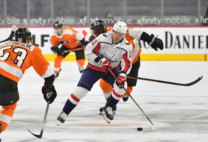 Mar 7, 2021; Philadelphia, Pennsylvania, USA; Washington Capitals left wing Jakub Vrana (13) carries the puck into Philadelphia Flyers zone during the first period at Wells Fargo Center. Mandatory Credit: Eric Hartline-USA TODAY Sports