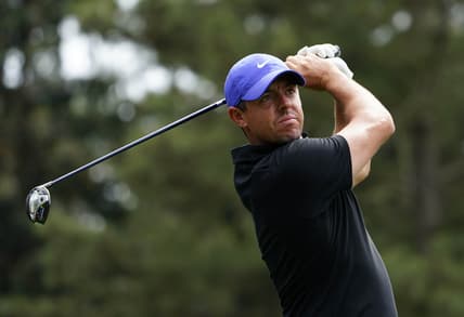 Apr 8, 2021; Augusta, Georgia, USA; Rory McIlroy hits his tee shot on the 18th hole during the first round of The Masters golf tournament. Mandatory Credit: Michael Madrid-USA TODAY Sports